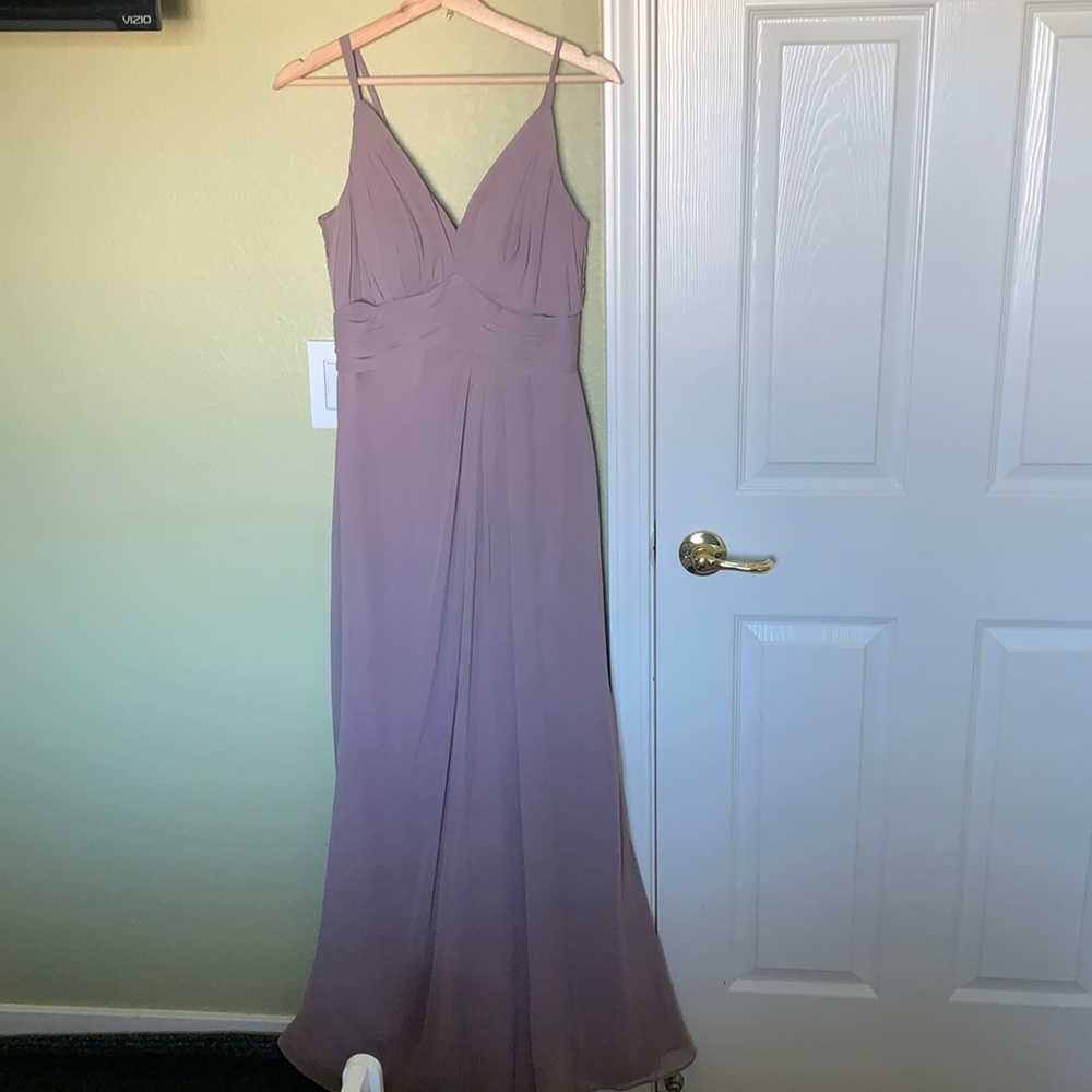 Beautiful lilac long dress. Formal and worn once at a wedding for couple hours.